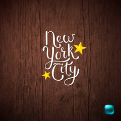 New York City Concept on Wooden Textured Background.
