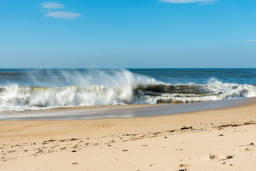 Wind and breaking waves on Granja beach south of Porto	