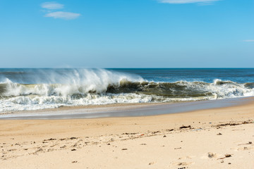 Wind and breaking waves on Granja beach south of Porto