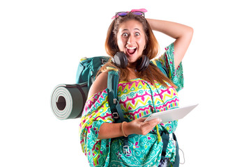 Traveling girl with backpack and tablet