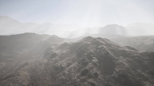 mountain landscape in high altitude with rays of light