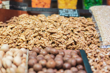 counter with organic nuts in vegan market b