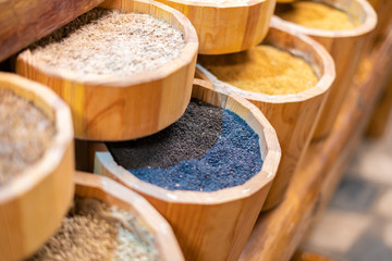 counter with rows of different grains in the market store f