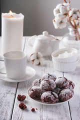 Red velvet cookies on white table for tea