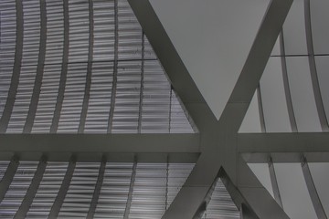 Fototapeta premium Steel cross in and triangles in black and white