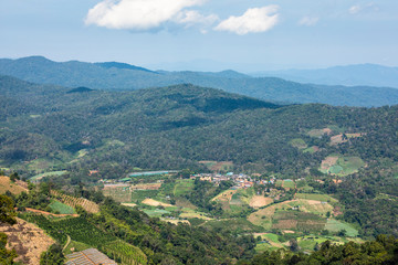 Fototapeta na wymiar mountain scape of village, agriculture plantation in the valley of Mon Cham, Mae Rim, Chiang Mai, Thailand