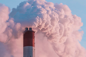 Factory smokestack with the smog