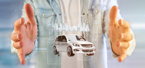 Businessman holding Dashboard smartcar interface with multimedia icon and city map on a background 3d rendering