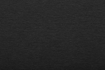 Black paper texture closeup © alexugalek