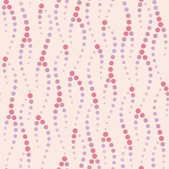 Seamless vector geometric pattern with circles in pastel pink colors. Abstract wave background