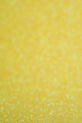 Abstract glitter yellow background for card and invitation