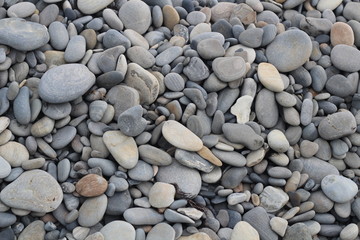 Fototapeta na wymiar Камни на пляже фоновое изображение.