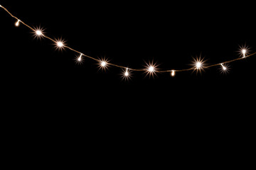 Christmas and New Year Decoration Lights, Garland with Small  Led Lamps Shining on Black Background.