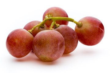 Ripe red grape isolated on white.
