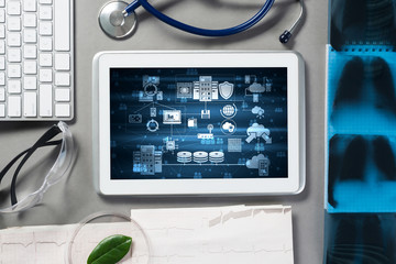 Concept of modern medicine with tablet on table from top view