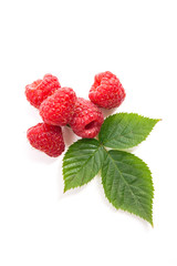 Ripe raspberries with leaf isolated on white background.