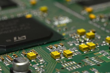 detail of components and chip on electronic circuit board