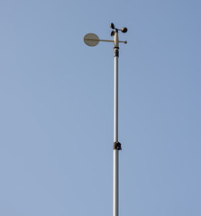 Meteorological station with anemometer and wind vane.
