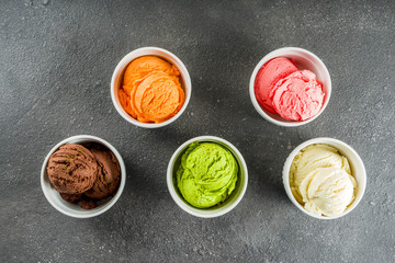 Colorful ice cream in creamers