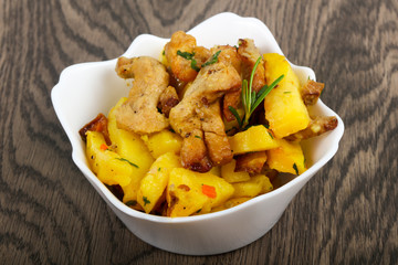 Fried potato with pork