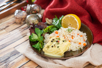 Andalusian fish, saffron rice with vegetables