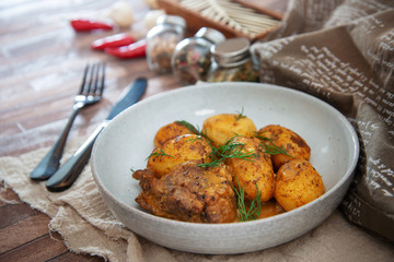 Piece of roasted pork and potatoes