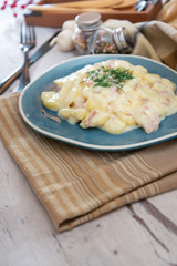 Gratin Of Potatoes, Ham, Eggs And Onions