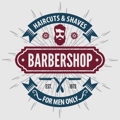 Barbershop vintage label, badge, or emblem on gray background. Vector illustration