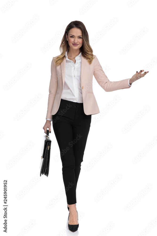 Poster sexy businesswoman with case walks and presents to side