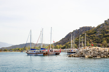 Fototapeta na wymiar Yachts in harbor of Mediterranean sea, Turkey.