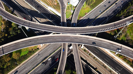 Aerial view of popular highway of Attiki Odos multilevel junction road, passing through National motorway, Attica, Greece