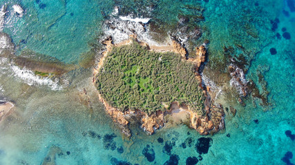 Aerial drone photo of tropical exotic caribbean paradise vegetated island with blue lagoon turquoise sea