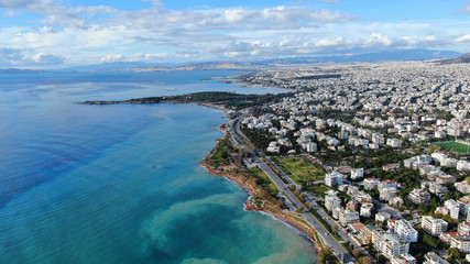 Aerial drone bird's eye view of small marina with boats docked in Voula, Athens riviera, Attica, Greece