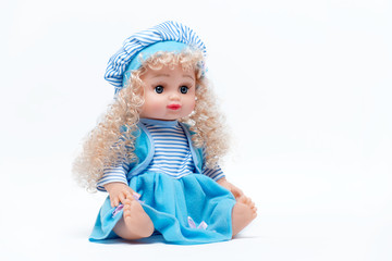  Doll with blond hair in a blue dress and hat