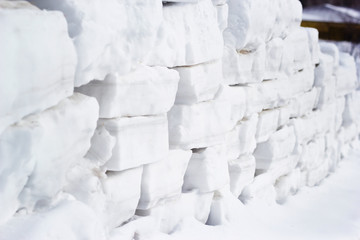 The wall is built of snow blocks