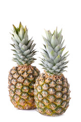 Fototapeta premium Two pineapples isolated on white background