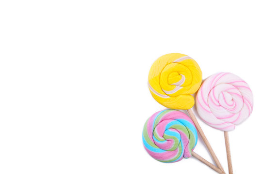 Colorful lollipops isolated on white background. Studio shot