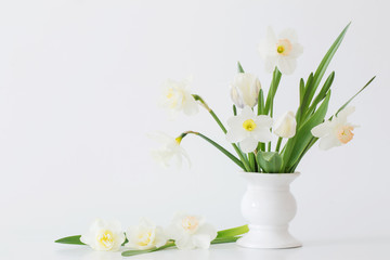 spring flowers in white vase