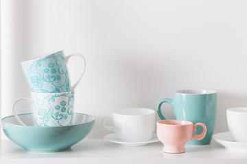 Clean dishes on wooden shelf
