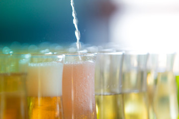 Filling wine glasses with soft and shimmering colors