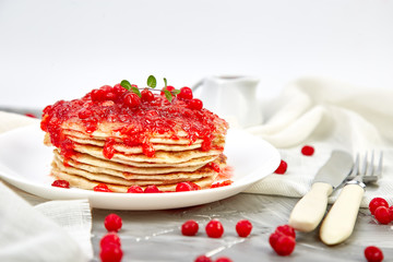 American pancake with jam - berry, viburnum, cranberry