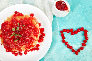 American pancake with jam - berry, viburnum, cranberry