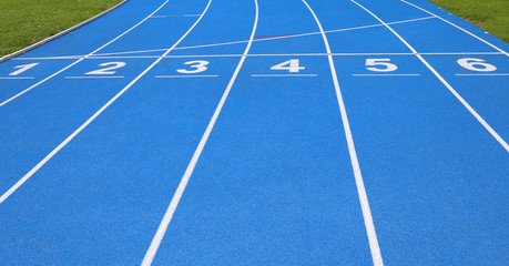 lanes of a athletic track with numbers one two three four five s