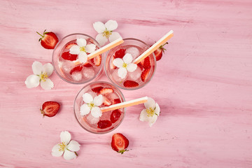 Fototapeta na wymiar Detox infused flavored water with three color raspberry