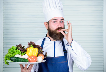 Cuisine culinary. Vitamin. Healthy food cooking. Mature hipster with beard. Dieting organic food. Vegetarian salad with fresh vegetables. Happy bearded man. chef recipe. Shopping day