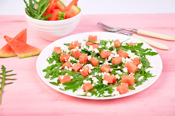 Fresh summer watermelon salad with feta cheese and arugula