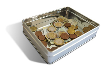 Spare euro coins on a tin case isolated on white background