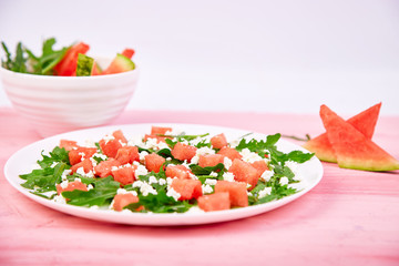 Fresh summer watermelon salad with feta cheese and arugula