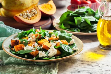 Poster Roasted pumpkin salad with spinach and nuts © Sławomir Fajer