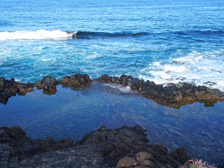 lonely natural pool on the seashore on north part of tenerife canary island